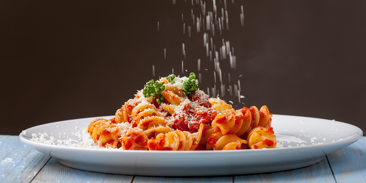 la tradizione racchiusa in un piatto pasta con Parmigiano Reggiano grattugiato